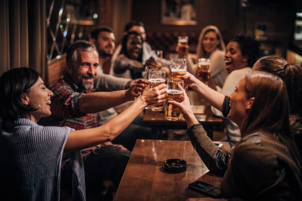 istock Happy friends in bar 1189778559