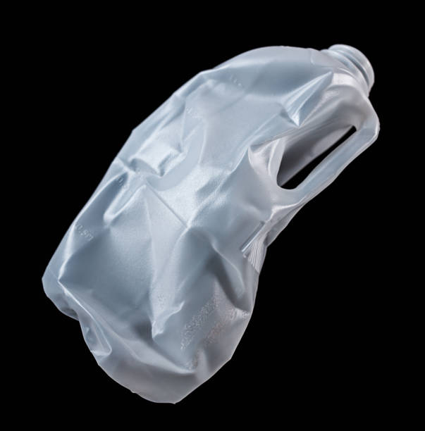 istock Crumpled Plastic Bottle against Black Background 1189781654