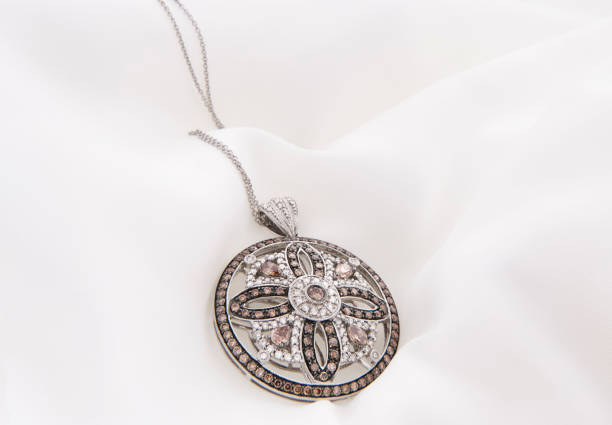 istock White Gold Necklace With White And Chocolate Diamonds 1189783908