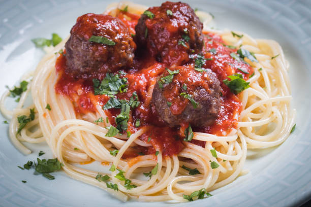 istock Meat balls with spaghetti pasta and tomato sauce 1189784889