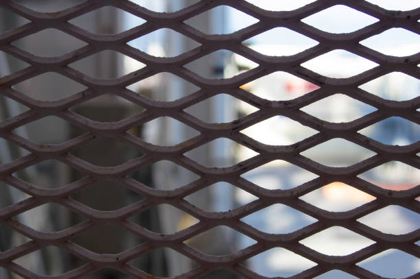 istock Close-Up View of Expanded Metal Mesh Panels 1189788316
