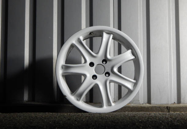 istock Disassembled Damaged Car Rim Near Garage 1189790543