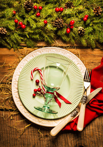 istock Rustic christmas wooden table setting design with natural decorations 1189793240