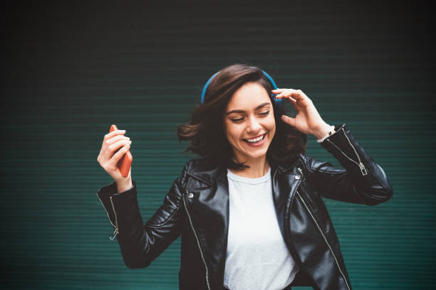 istock Millennial girl enjoying disco music 1189795891