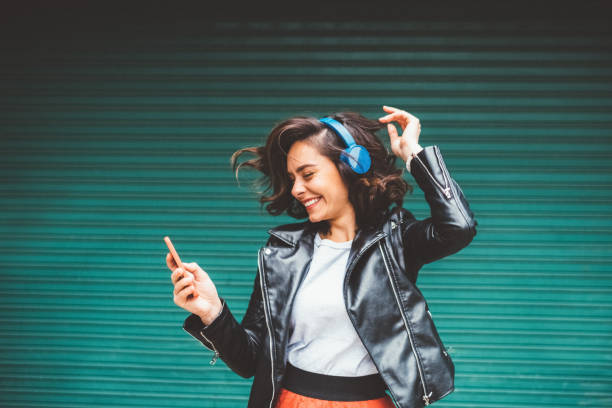 istock Millennial girl enjoying disco music 1189795937
