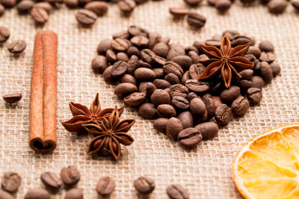 istock Heart shaped roasted coffee beans on burlap 1189800230