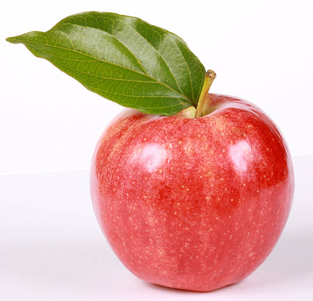 Red Fresh Apple with Leaf stock photo