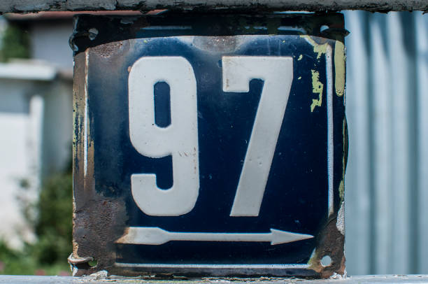istock Weathered enameled plate number 97 1189802165