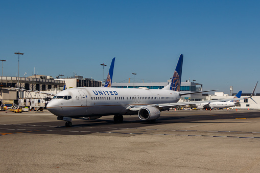 United Airlines Aircraft taxiing at Los Angeles Airport on a sunny day