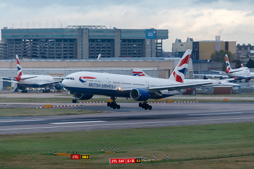 British Airways Boeing 777 Aircraft G-YMMO Landing at London Heathrow International Airport
