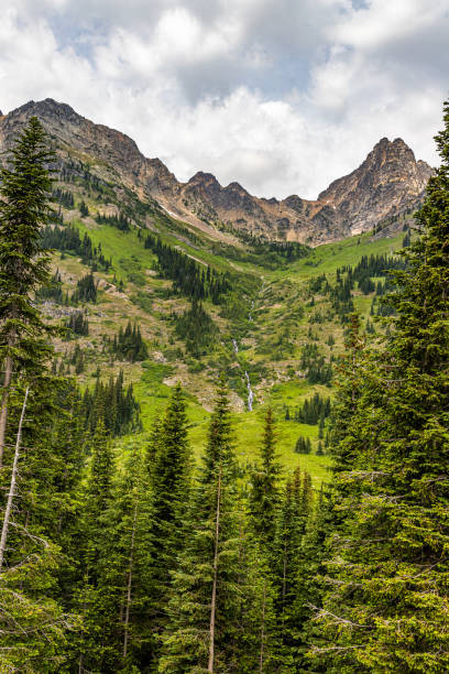 North Cascades National Park North Cascades National Park is a remote, rugged wilderness in the North Cascades mountain range of northern Washington state. north cascades national park cascade range waterfall snowcapped stock pictures, royalty-free photos & images