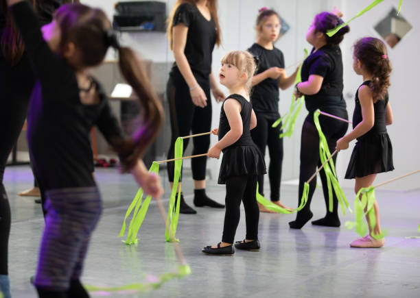 istock Kids Down Syndrome dance studio class therapy 1189811815