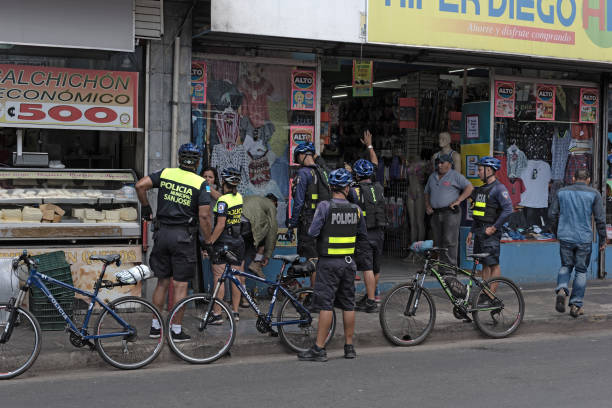 police with bicycles in the downtown area of "u200b"u200bsan jose costa rica stock photo