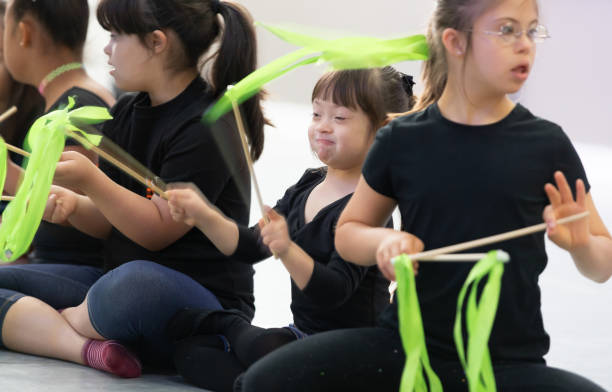 istock Kids Down Syndrome dance studio class therapy 1189812674