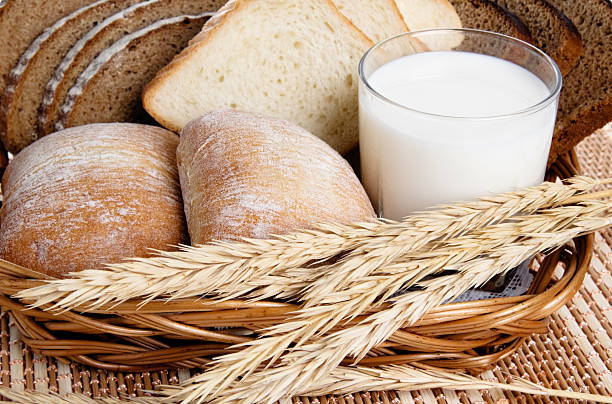 istock Rolls, bread and a glass of milk 118981285
