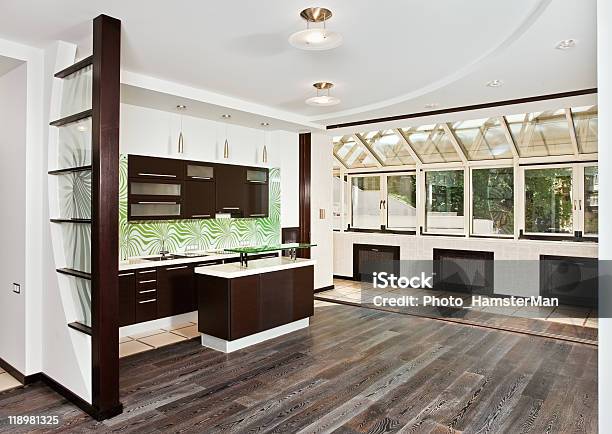 Modern Drawingroom And Kitchen Interior With Dark Wooden Floor Stock Photo - Download Image Now