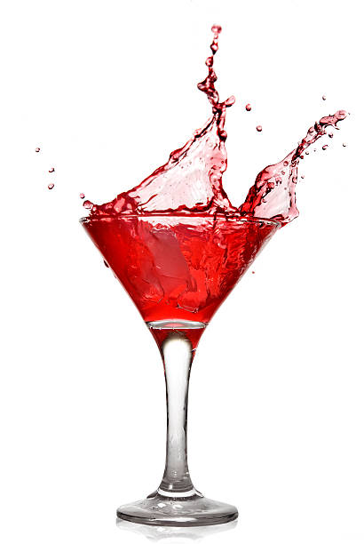 istock Red cocktail with splash isolated on white 118981453