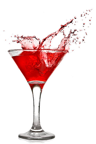 istock A red cocktail with splash isolated in white background 118981454