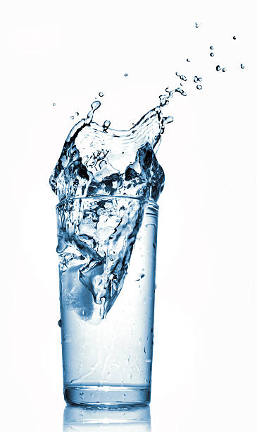 istock ice dropped into water isolated on white 118981486