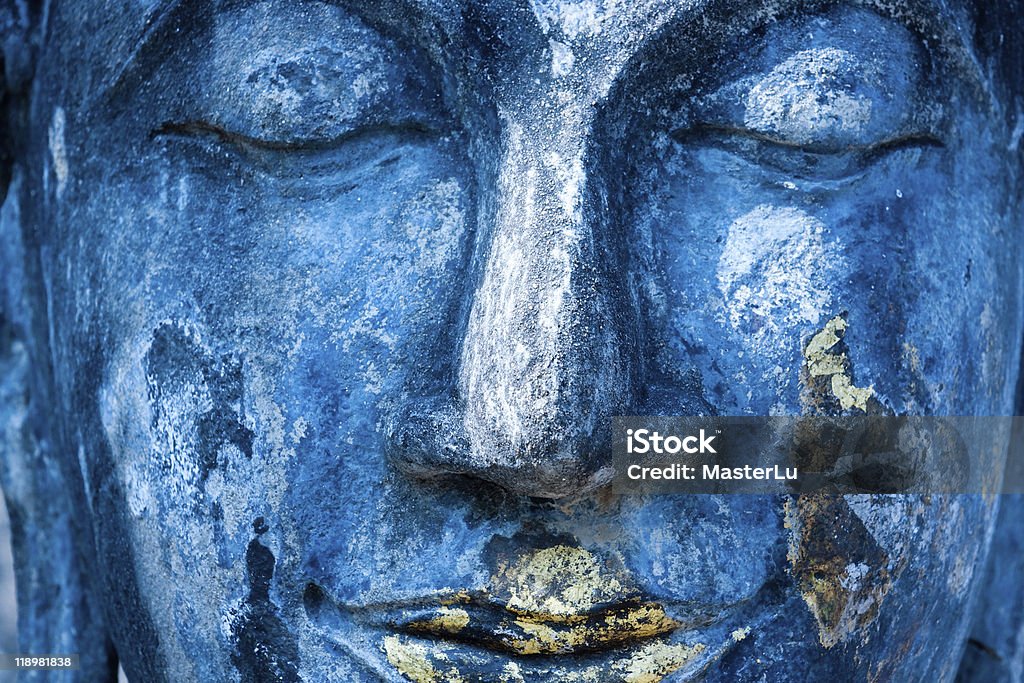Buddha face, Sukhothai, Thailand. Blue. Buddha face, Sukhothai, Thailand. Ancient Stock Photo