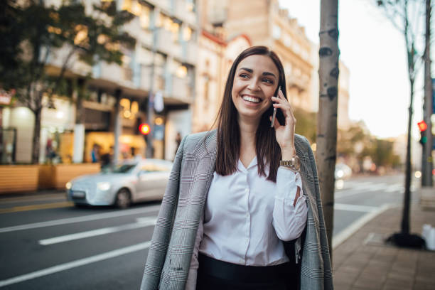 istock Happy woman talking with friend 1189819108
