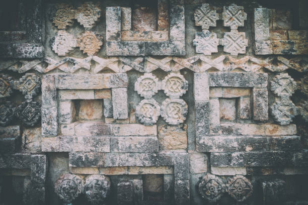 Pattern background from Mayan ruins of Uxmal Pattern background from Mayan ruins of Uxmal valladolid mexico photos stock pictures, royalty-free photos & images