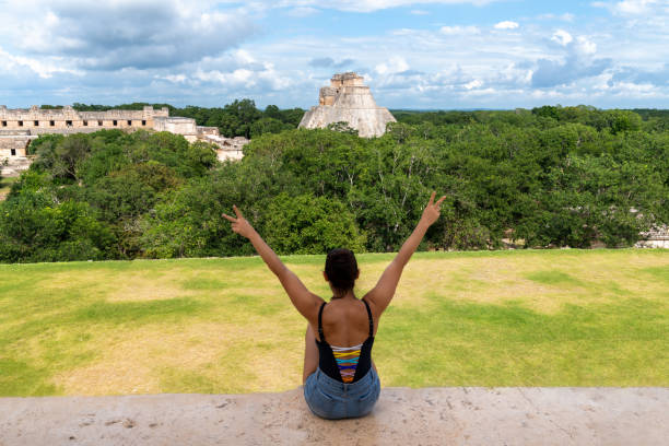 istock Tourist visiting Mayan ruins in Yucatan, Mexico 1189827647