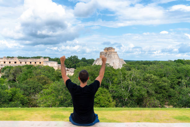 istock Tourist visiting Mayan ruins in Yucatan, Mexico 1189827681