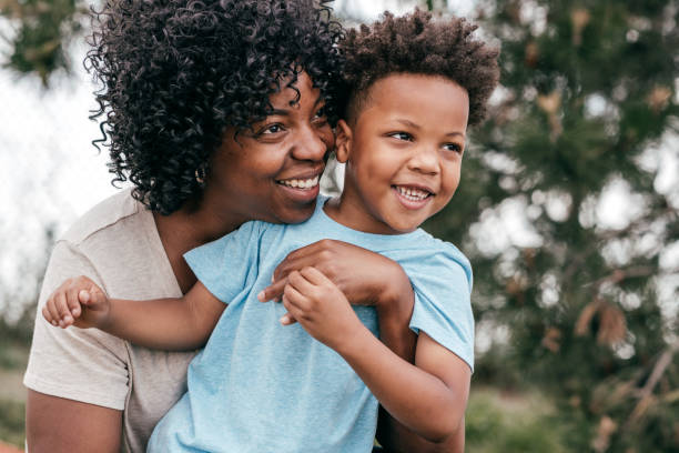 istock Mom and smiling with son 1189829030