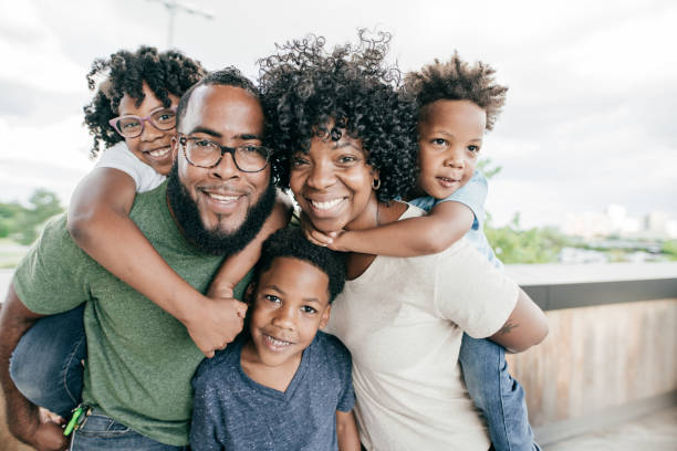 istock Happy family looking at camera 1189829057