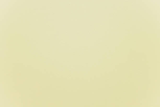 istock Concrete wall yellow color for texture background. 1189829258
