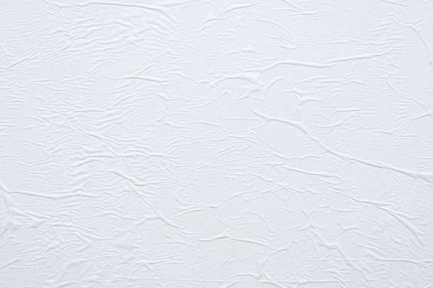 Blank white crumpled and creased paper poster texture background