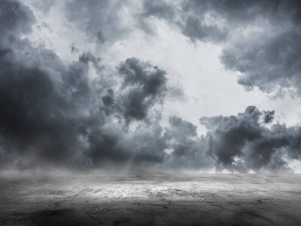 istock Stormy clouds and concrete floor for background 1189840268