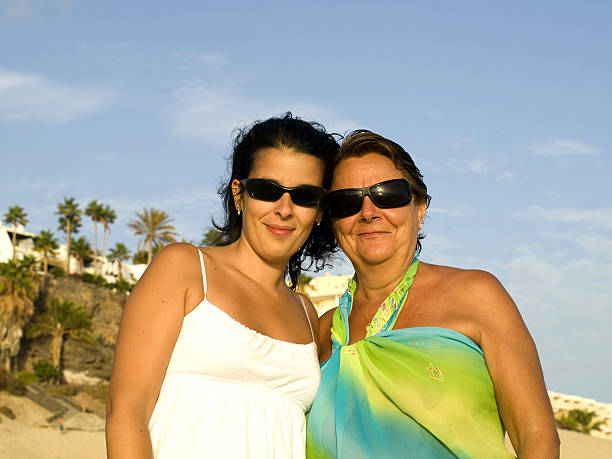 istock Mother and Daughter in a beach resort 118984079