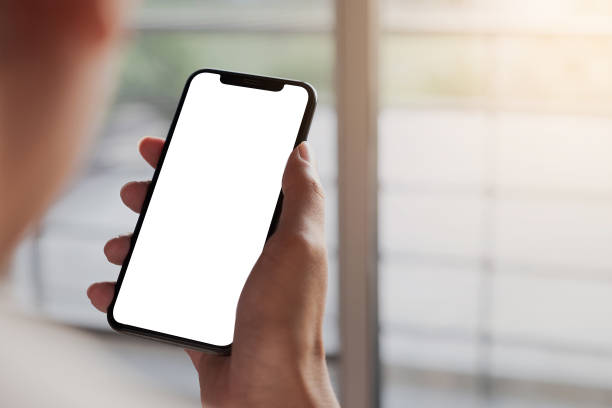 istock woman using Smartphone. Blank screen mobile phone for graphic display montage.networking service. 1189843408
