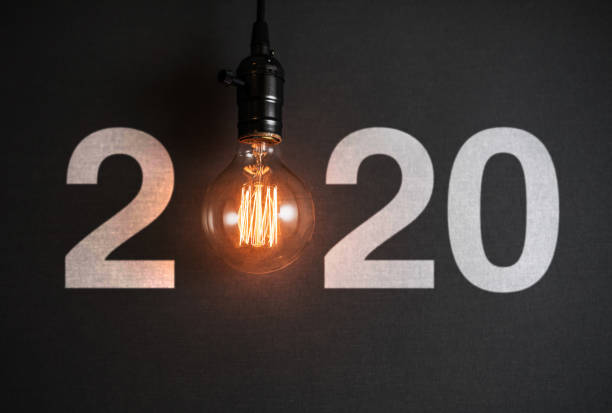 istock new year 2020 Light bulb on gray background 1189845985