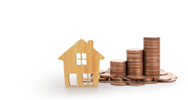 istock Coin stack house model savings plans for housing,hom 1189846434
