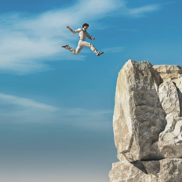 istock Man jumping to a high altitude mountain peak. 3d render illustration 1189860592