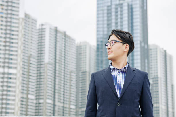 istock Businessman looking at new district 1189861963