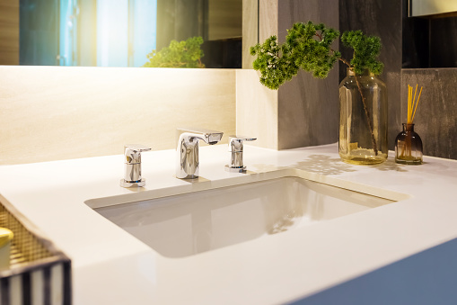 closeup bathroom sink with amenity decoration