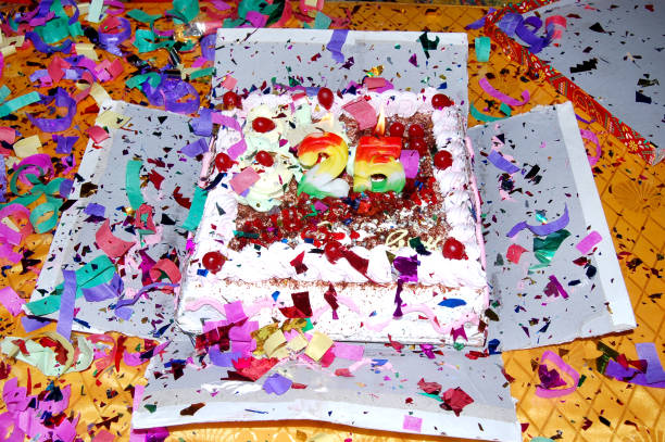 istock Birthday cake with colorful candles 1189873710