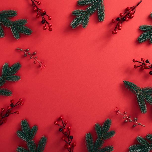 istock Christmas decoration on red background 1189873806