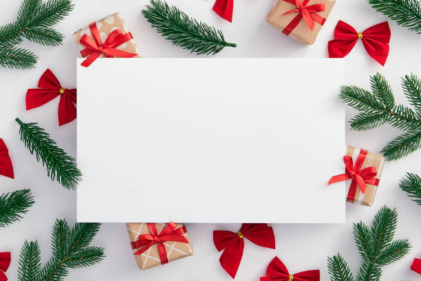 istock Christmas tree branch and red bow decoration 1189873831