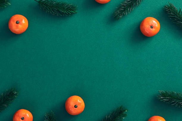 istock Christmas composition on dark green background 1189874424
