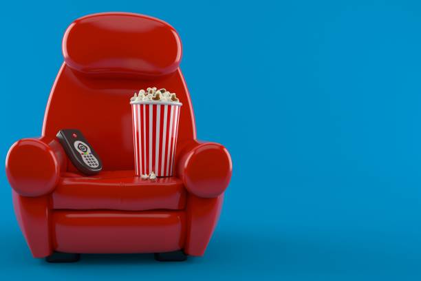 istock Armchair with popcorn and remote 1189875570