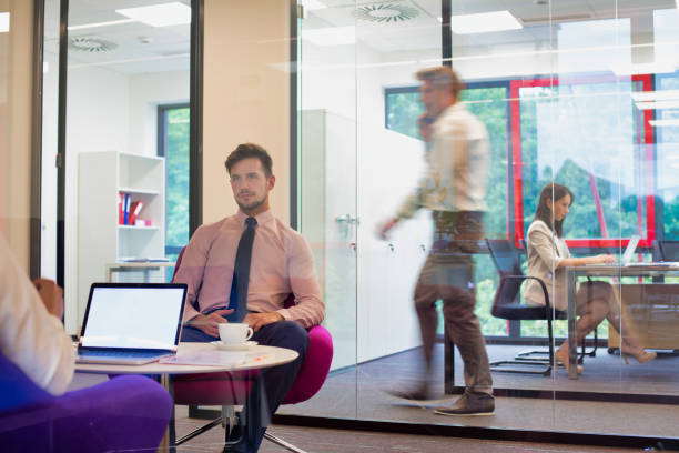istock Busy business people working in office 1189875654