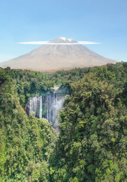 istock Waterfall, volcano and tropical rainforest in Indonesia 1189878361
