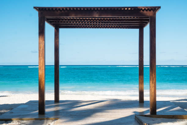 istock Beautiful wooden gazebo on the beach 1189881435