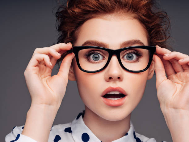 istock Beautiful girl with eyeglasses 1189884557