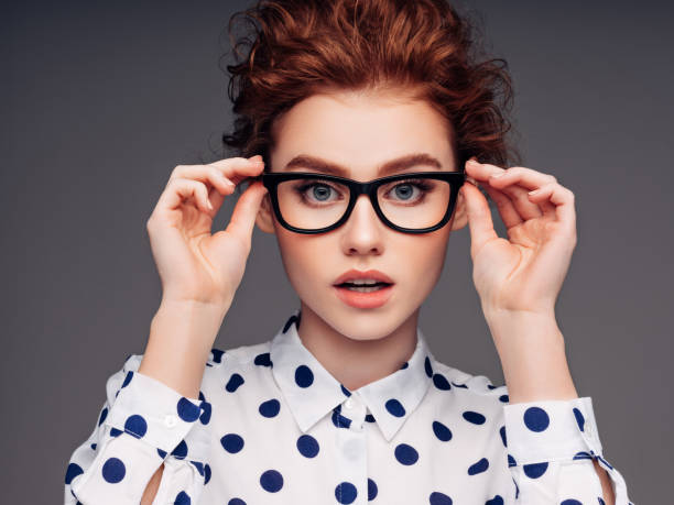 istock Beautiful girl with eyeglasses 1189884609